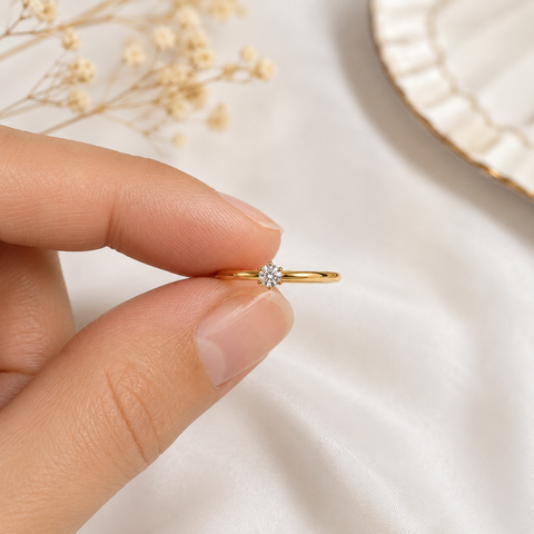 Radiant Tiny Solitaire Ring.