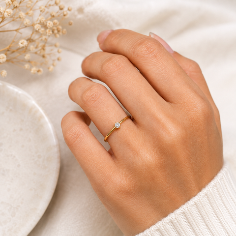 Radiant Tiny Solitaire Ring.