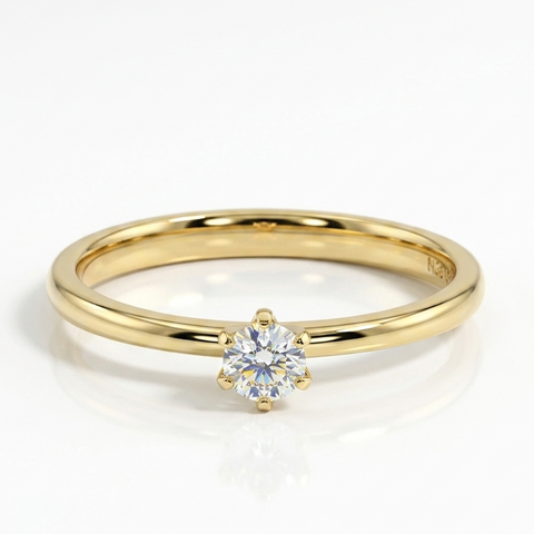 Radiant Tiny Solitaire Ring.
