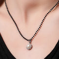 Round Zirconia and Freshwater Pearl Mangalsutra. - KORE JEWELS 